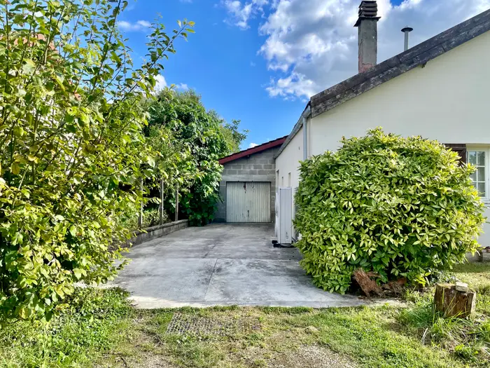 Garage vue gauche, Maison à vendre Charmont Marne